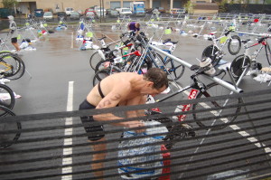 Looking for his triathlon race number and singlet, Doug Landau loses precious time in transition