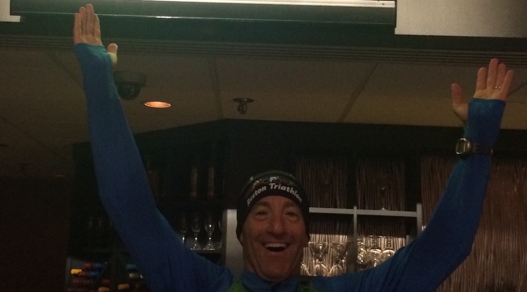 At a bar before 9 AM on Super Bowl Sunday ! Doug Landau enjoys a British Premier League game during the PreGame 5km awards ceremony at the National Conference Center in Leesburg, Virginia