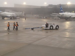 Airport and Airline workers are at significant risk of injury on the Airport Operations Area ("AOA") because of the loud aircraft noise, vibrations and jet fuel smells. Deprived of most senses, any distraction, by the pedestrian or the driver, can be catastrophic t the man or woman on foot.