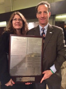 Cynthia Burgett, Rachel Carson middle school teacher, & Doug Landau, Herndon Virginia trial lawyer, holding the plaque for the "we the people" national championship competition. The Northern Virginia public junior high school, improved upon last years third-place finish & won the competition