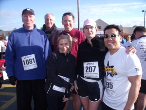 Sport & Health Club Spin Cycle instructor Lisa Adams (in hat) brought runners in support of the Rockstar running race