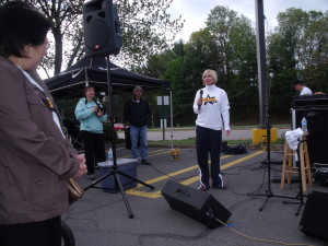 Physical Therapist Jo Burton speaks before the Rockstar scholarship race in Burke