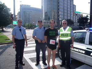 Herndon sports injury lawyer Doug Landau and law enforcement volunteers at a local running race