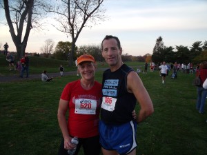 Fairfax attorney and athlete Cynthia Kaplan Revesman and Doug Landau of the Herndon law firm ABRAMS LANDAU, Ltd. are all sweat and smiles after completing the Town of Herndon Turkey Trot race