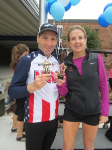 Top age group road racer Sarah Buckheit and Doug Landau were winners at the "Blue Jay 5km and Heroes" races in Manassas Virginia