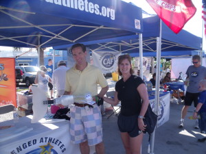 Herndon Virginia injury lawyer Doug Landau & his wife with one of the artificial tails made for "Winter," the dolphin whose tail was amputated and the star of the new movie "Dolphin's Tale", at the Clearwater Marine Aquarium this past May