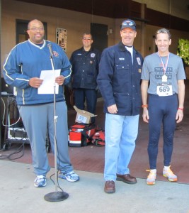 Race Director Walter English at the City of Fairfax Fire Benevolent Fund 5k and Herndon fire and burn injury lawyer Doug Landau, who was 3rd overall