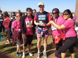 Manassas Airport Runway race prize winner Doug Landau is all smiles after collecting his age group award
