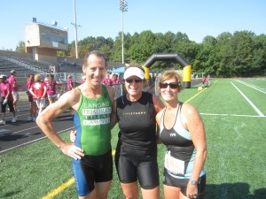 Herndon bike injury lawyer Doug Landau, popular spin bike instructor Denise Morgan & Melissa Landau are all smiles after the 30th Annual Reston Triathlon at Sough Lakes High School