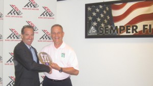 At the Marine Corps Marathon Triathlon Awards ceremony in Quantico Virginia, Herndon injury lawyer Doug Landau receives his prize for top place over 50 and 5th overall