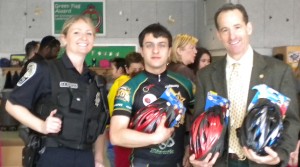 Herndon Police, the George Mason University Bike Club and Herndon law firm ABRAMS LANDAU injury lawyer Doug Landau fit each 6th grader with a brand new bike helmet at Herndon Elementary School 