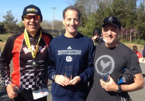 Westfields Sprint Triathlon Masters Champ Darren Wrigley, originally from Australia, Age Group Winners Lester Benitez and Doug Landau with their awards