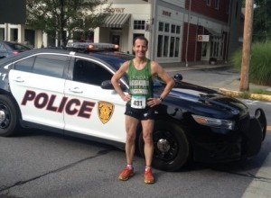 After copping yet another age group award and top 20 overall finish, Litchfield County CT injury lawyer Doug Landau poses on the main street of Rhinebeck New York after the annual "Mad Dash" 5km. road race