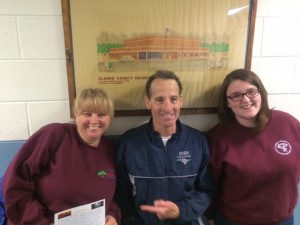 "Zombie averse" injury lawyer Doug Landau, with Clarke County Virginia Park & Recreation, staff points out Race Director Tracey Pitcock