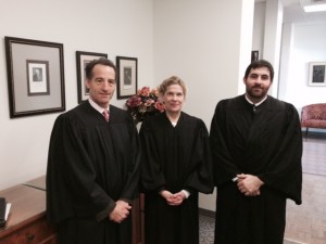 Landau, left, donned a judge's robe to participate in the William B. Spong Invitational Moot Court Tournament in Williamsburg, VA.