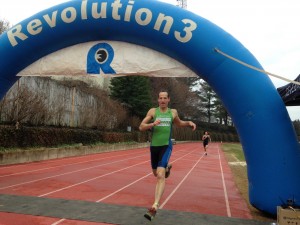 After racing around the track barefoot & stripping off his dry wetsuit, Doug Landau won his heat at the DC Multisport Expo's Transition Race at American University