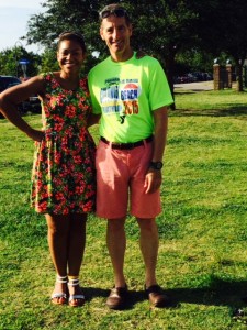 "First Timer" Dr. Tiffani Bright and "Old Timer" Triathlete Doug Landau are all smiles at Buckroe Beach packet pick up in Hampton, Virginia