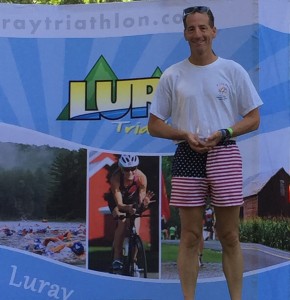 Doug Landau on the podium at the USAT Mid-Atlantic Regional Championships in Luray, Virginia