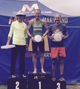 Age Group winners received acorn clocks. Bill Coquelin, Doug Landau & Ben Foy enjoy their awards on the podium