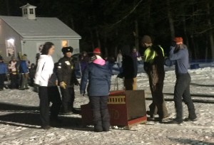 A fire truck sled entrant in the Human Powered Dog Sled race during SWSA's "Friday Night Lights"