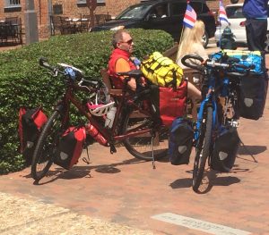 Bikers from all over the world, like these bicycle tourists visiting Colonial Williamsburg, need to know the "rules of the road" in order to avoid injury. 