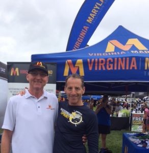 Top Virginia & Maryland Super Series racer (AND race organizer) Don White & Series sponsor Doug Landau, pose in front of the VTS/MTS tent at the USAT National Championships pre- race expo in Omaha, Nebraska.