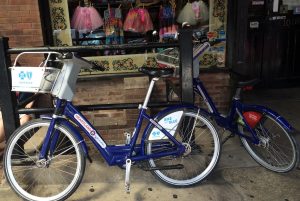 These blue Heartland bikes in Omaha are the equivalent of the shared "CitiBikes" of NYC and "Capitol Bike Share" cycles of DC. When used properly in the bike lanes, they have the 'right of way' over cars, trucks and even minivans