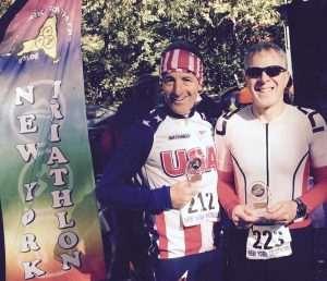 Age group prize winners Paul Greenberg & Doug Landau are all smiles as the sun came out at the end of the 32nd annual Central Park DUathlon in the heart of New York City