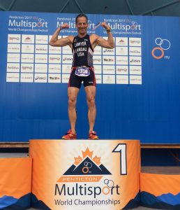 While breathing "like a wounded water buffalo during the race, Doug Landau was recovered enough a half hour later to strike a pose on the podium after the DUathlon Sprint World Championship race in British Columbia