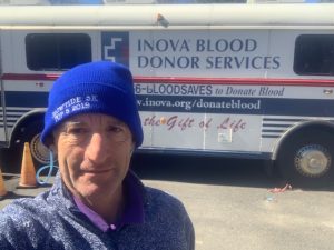 Doug Landau donating blood