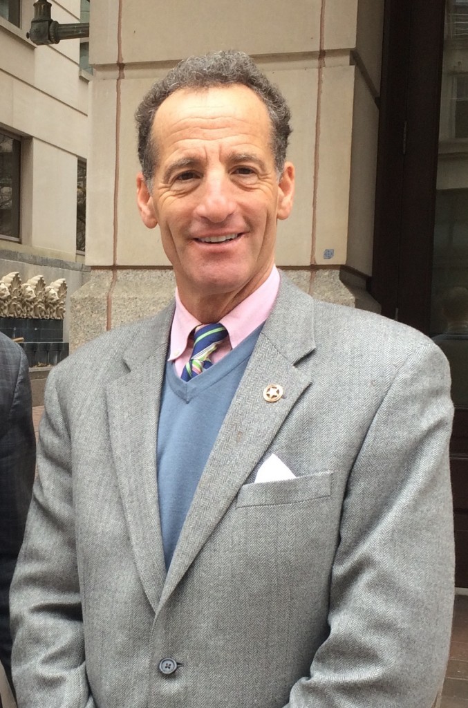 Workers Comp Attorney Doug Landau in gray suit