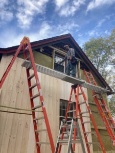 precarious perch on scaffolding: risk of injury on the job