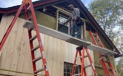 precarious perch on scaffolding: risk of injury on the job