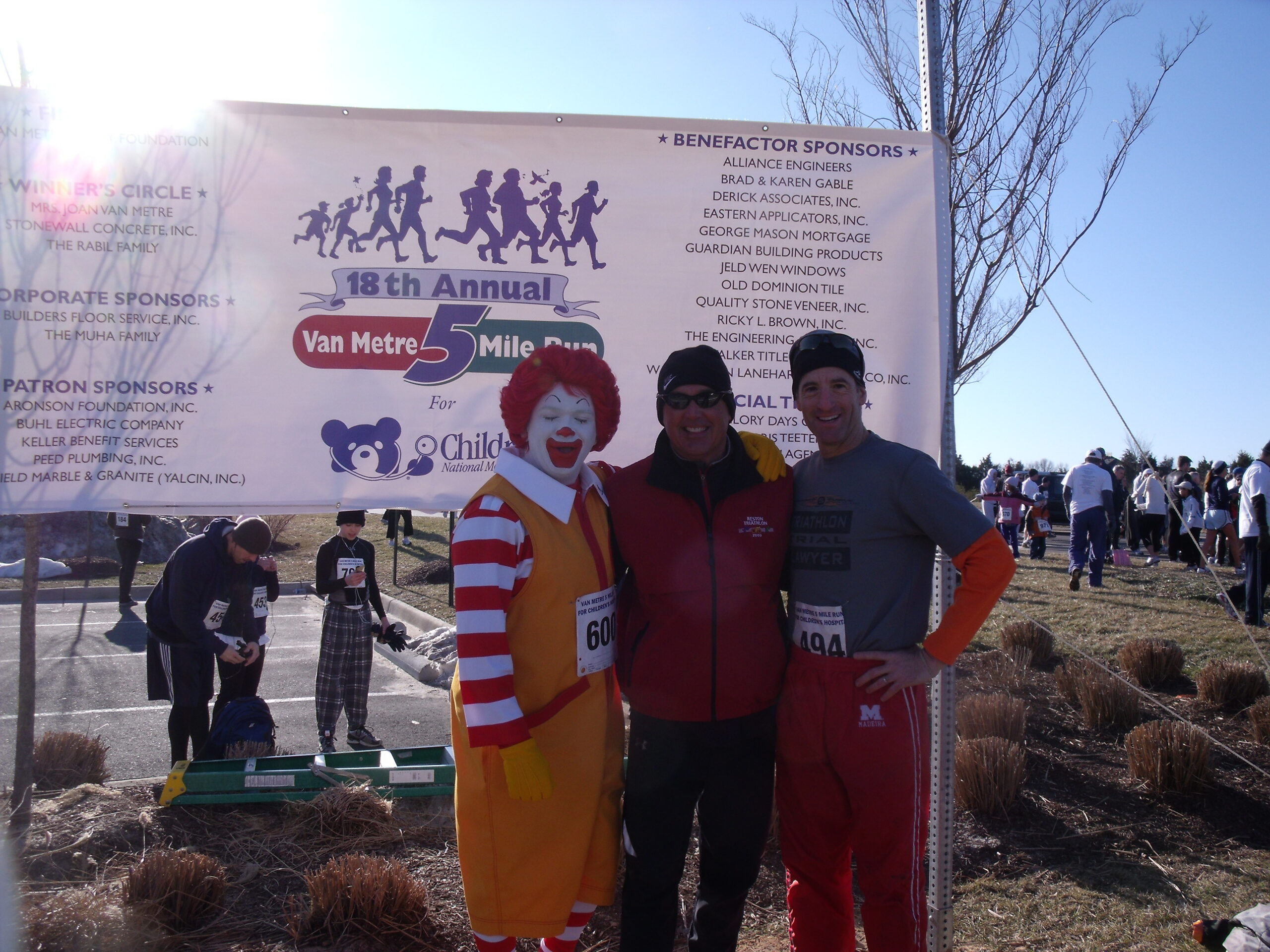 Ronald McDonald, Hamon Race Director Tom Cook and Broadlands injury lawyer Doug Landau before the Van Metre 8km