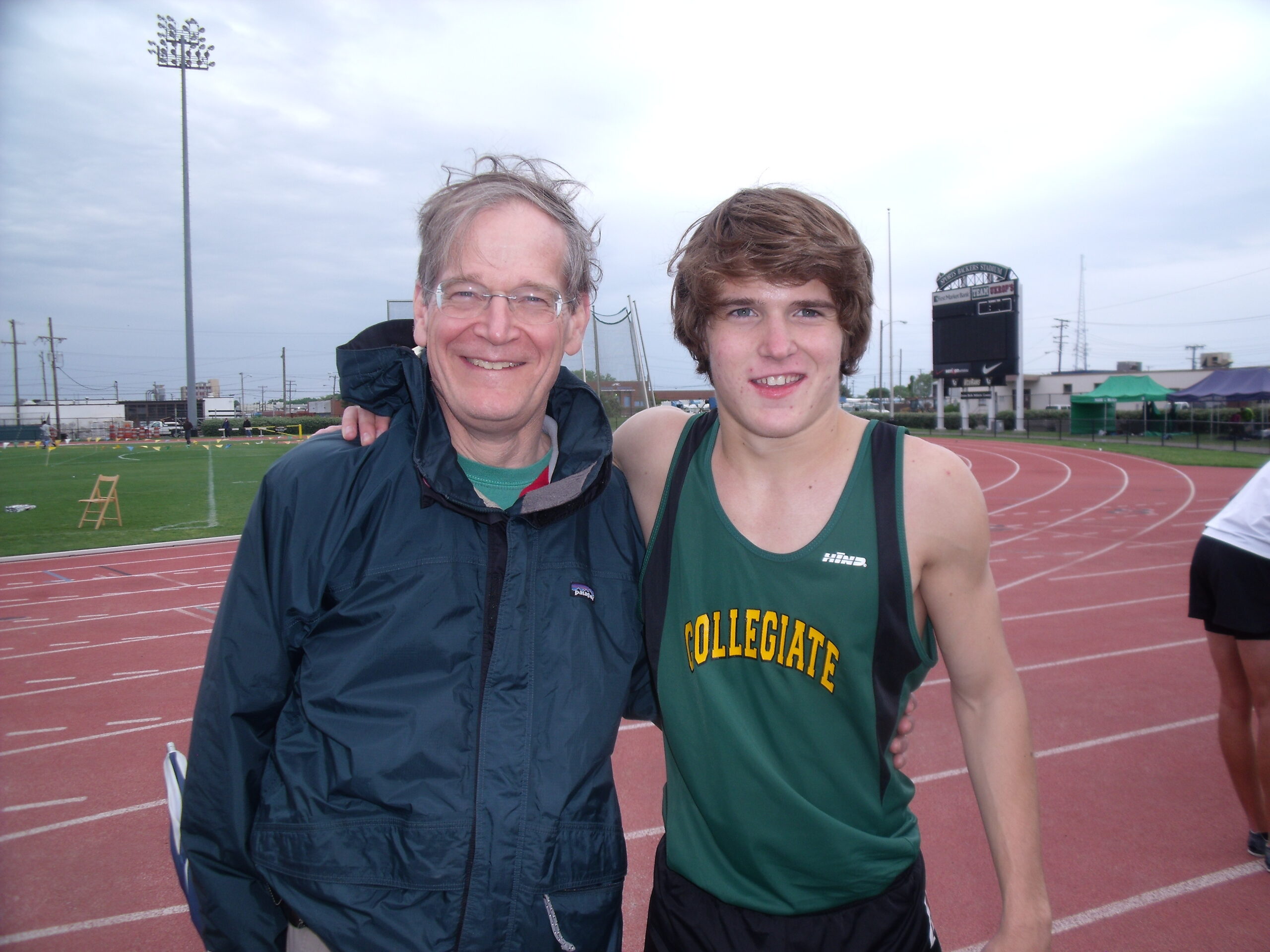 David Allen after breaking 2 minutes for the 800 with his proud father Ted Allen at Sportsbackers Stadium in Richmond