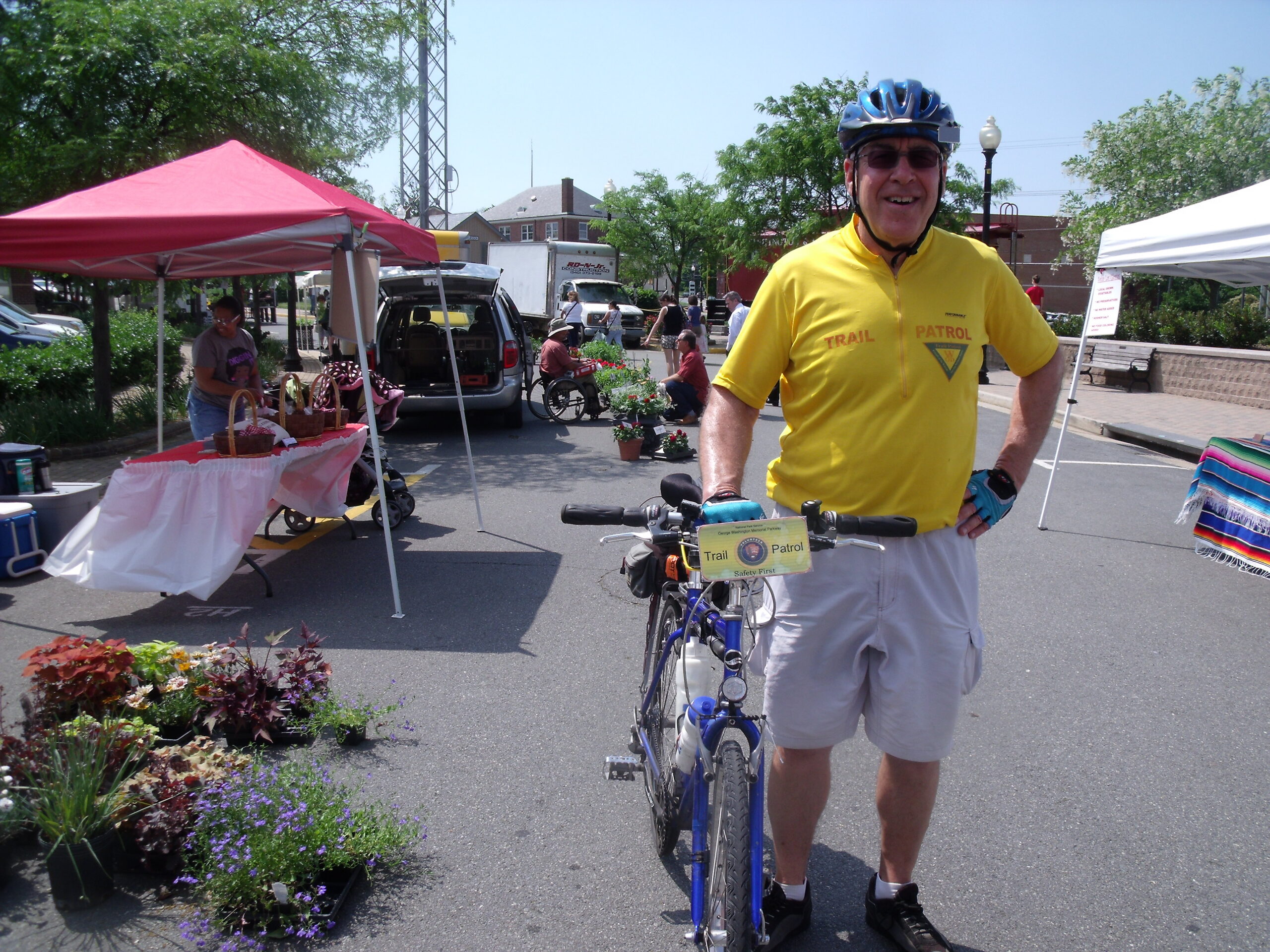 W&OD Trail patrol member visits Thursday Farmers Market in down town Herndon, just down the street from the Landau Law Shop