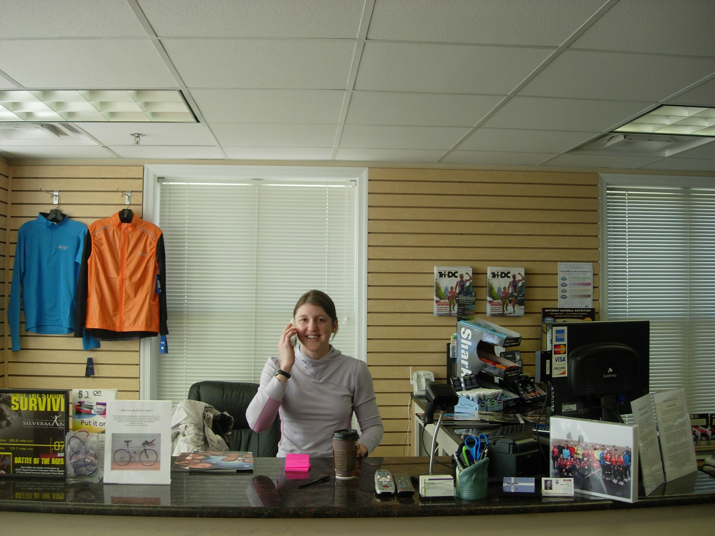 Shandra Richardson of Riptide Swim & Sport helping a customer over the phone.