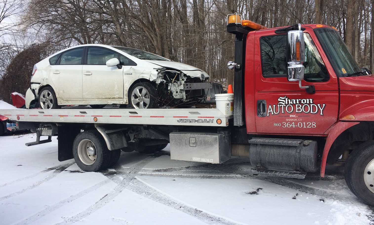 The Sharon Auto Body wrecker that extracted Doug Landau's Prius after it slid off the road on "black ice" and crashed this morning