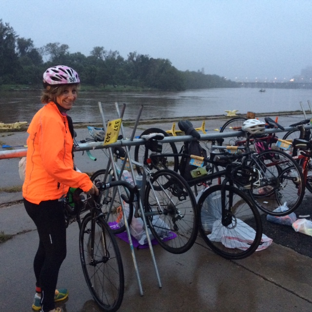 Melissa Landau racks her bike for the Rockettes Landing Olympic Distance DUathlon, with the mighty James River and downtown Richmond in the background