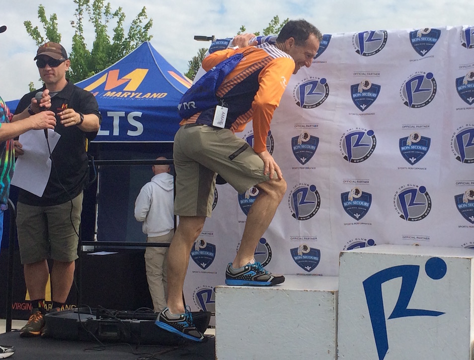 After popping his soleus a half mile into the 5km run at the April Richmond Sprint Triathlon, lawyer Landau hopped the remaining miles & then hobbled onto the podium for his prize. The rest of the season required careful training, therapy, pre-race rest & recovery
